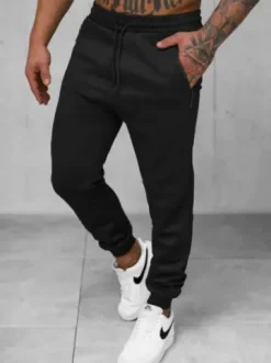 Spodnie dresowe męskie czarne JS/15K1818/3^Ozonee Fashion