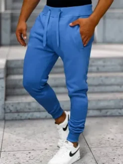 Spodnie dresowe męskie niebieskie JS/XW01Z^Ozonee Fashion