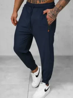 Spodnie sportowe męskie granatowe JS/12K1805/25^Ozonee Fashion